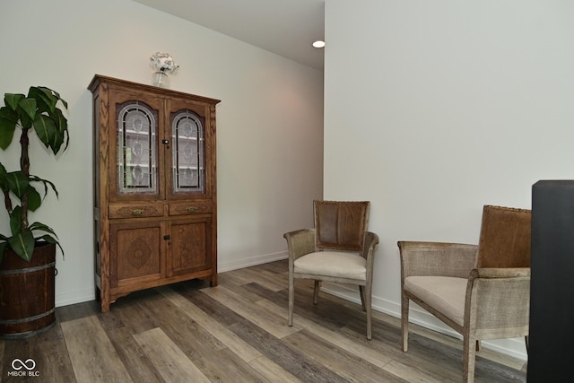 7070 Dean Rd, Indianapolis, IN 46220 - sitting room with wood finished floors and baseboards