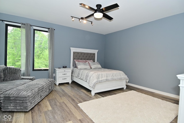 7070 Dean Rd, Indianapolis, IN 46220 - bedroom featuring wood finished floors and baseboards