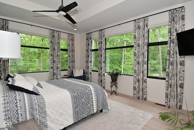 7070 Dean Rd, Indianapolis, IN 46220 - bedroom with baseboards, wood finished floors, ceiling fan, and recessed lighting