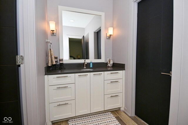 7070 Dean Rd, Indianapolis, IN 46220 - bathroom with vanity and wood finished floors