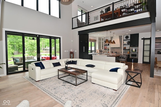 7070 Dean Rd, Indianapolis, IN 46220 - living room with light wood-type flooring and a high ceiling