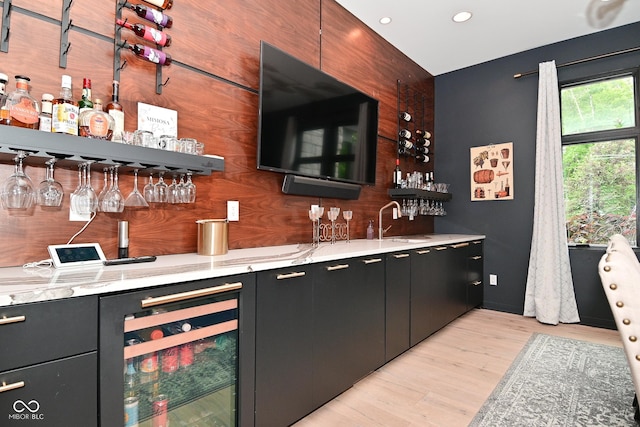 7070 Dean Rd, Indianapolis, IN 46220 - indoor wet bar featuring beverage cooler, light wood-style flooring, and recessed lighting