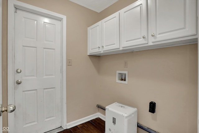 7637 Sand Run Ct, Indianapolis, IN 46259 - laundry area featuring hookup for a washing machine, cabinet space, baseboards, and dark wood finished floors