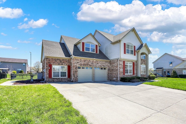 7637 Sand Run Ct, Indianapolis, IN 46259 - traditional-style house with driveway, brick siding, roof with shingles, and a garage