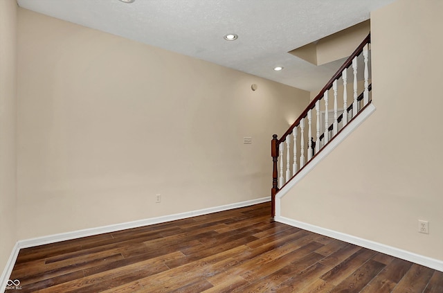 7637 Sand Run Ct, Indianapolis, IN 46259 - foyer entrance with baseboards, dark wood-style flooring, recessed lighting, stairway, and a textured ceiling