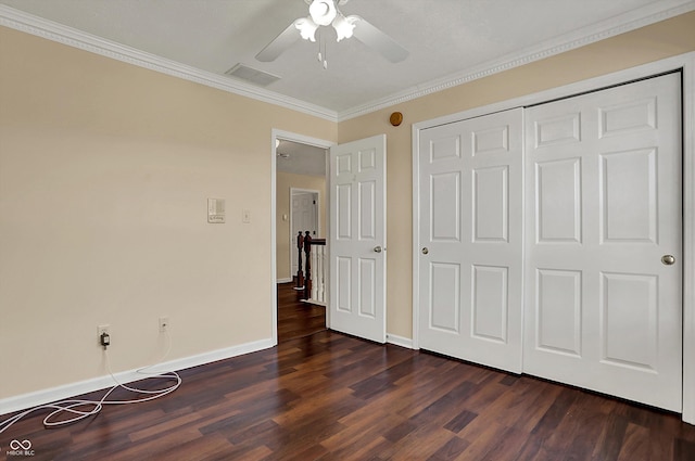 7637 Sand Run Ct, Indianapolis, IN 46259 - unfurnished bedroom featuring dark wood finished floors, crown molding, baseboards, a closet, and a ceiling fan