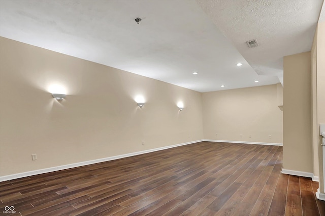 7637 Sand Run Ct, Indianapolis, IN 46259 - finished below grade area featuring dark wood-style flooring, baseboards, and recessed lighting
