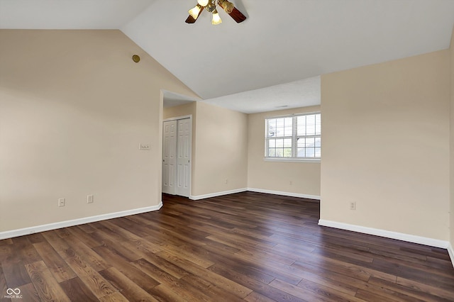 7637 Sand Run Ct, Indianapolis, IN 46259 - unfurnished room with vaulted ceiling, dark wood finished floors, baseboards, and a ceiling fan