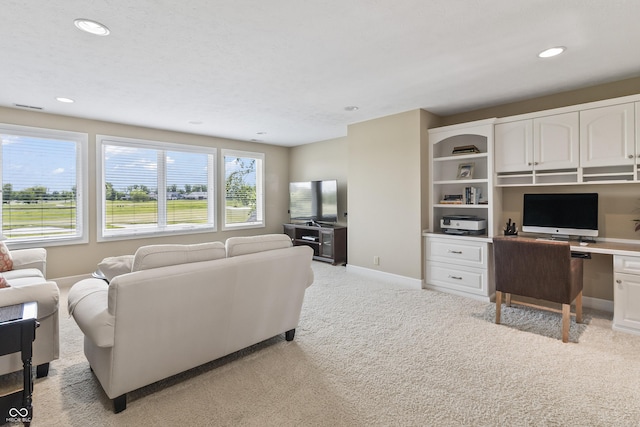 16502 Grand Cypress Dr, Noblesville, IN 46060 - living area with light carpet, recessed lighting, baseboards, and a desk