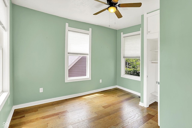 514 Dorman St, Indianapolis, IN 46202 - unfurnished room with plenty of natural light, wood-type flooring, and baseboards