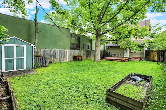 514 Dorman St, Indianapolis, IN 46202 - view of yard featuring a deck and a vegetable garden