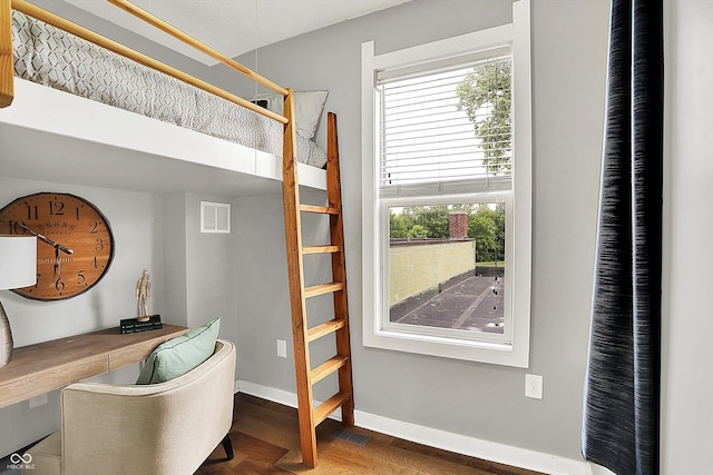 514 Dorman St, Indianapolis, IN 46202 - bedroom featuring wood finished floors and baseboards