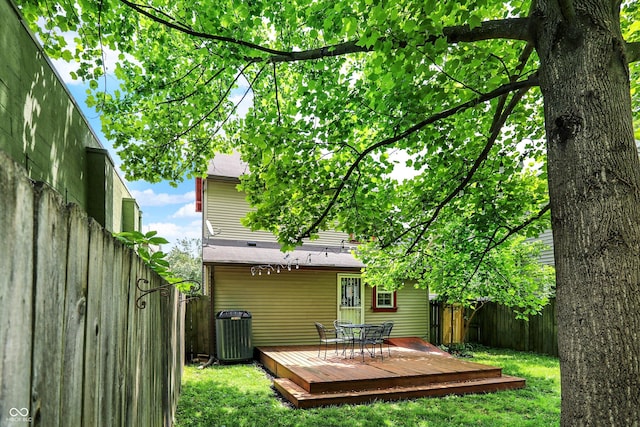 514 Dorman St, Indianapolis, IN 46202 - back of property with a deck and cooling unit