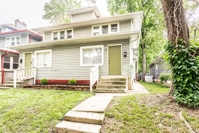 4409 N College Ave, Indianapolis, IN 46205 - american foursquare style home featuring entry steps and a front lawn