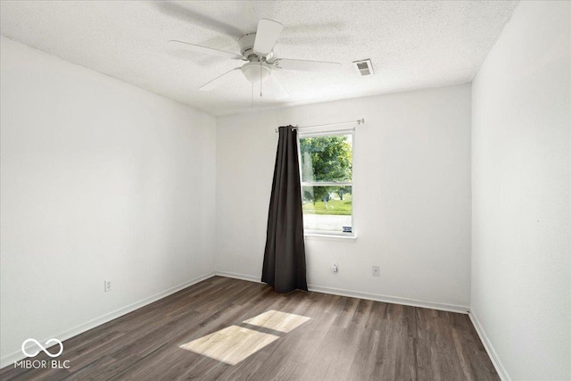 11821 Wapiti Way, Noblesville, IN 46060 - unfurnished room featuring wood finished floors, a ceiling fan, baseboards, and a textured ceiling