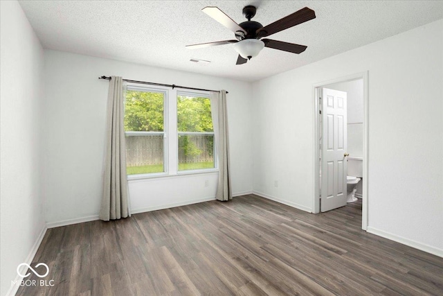 11821 Wapiti Way, Noblesville, IN 46060 - spare room featuring wood finished floors, a ceiling fan, baseboards, and a textured ceiling