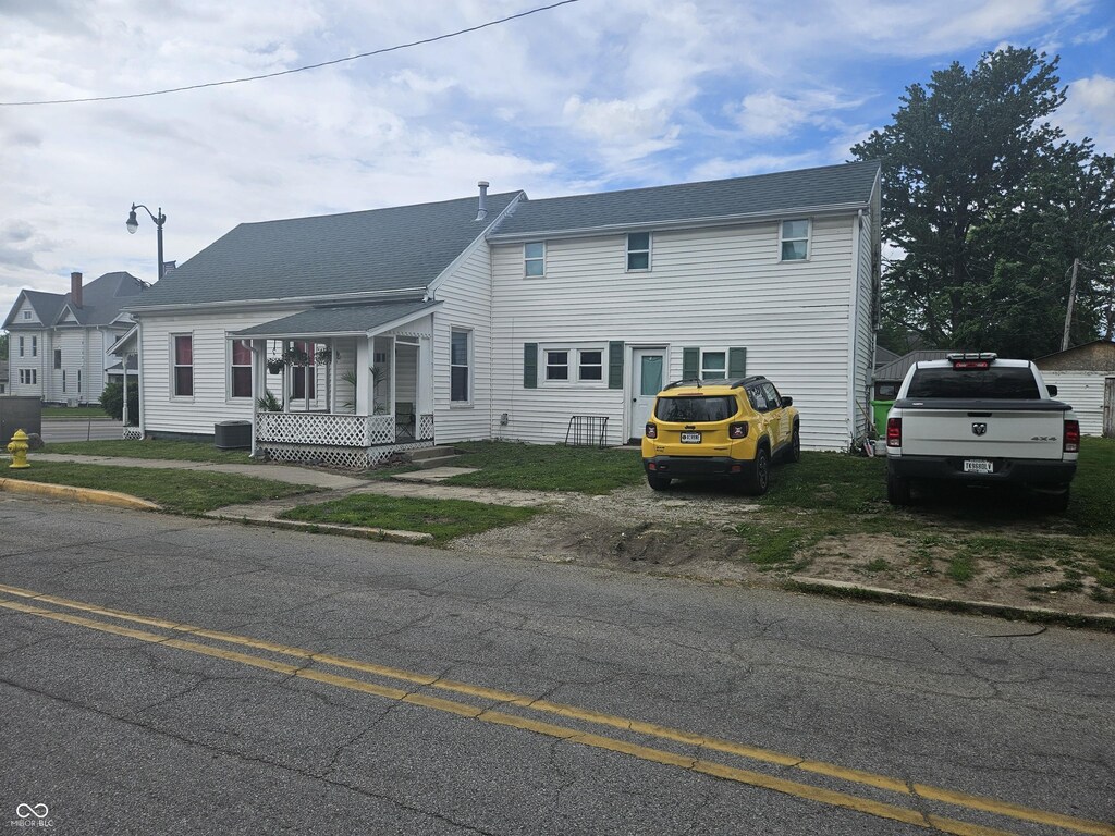 418 S Washington St, Crawfordsville, IN 47933 - view of front of property with cooling unit and roof with shingles
