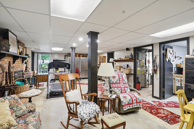 1712 S Flatrock River Rd, Rushville, IN 46173 - below grade area with a drop ceiling and a fireplace