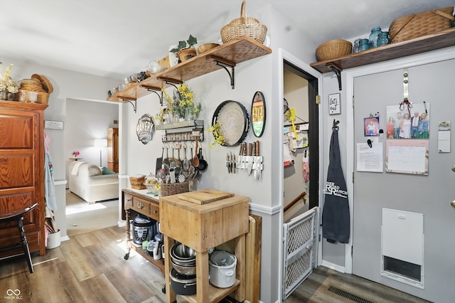 1712 S Flatrock River Rd, Rushville, IN 46173 - kitchen with open shelves and wood finished floors
