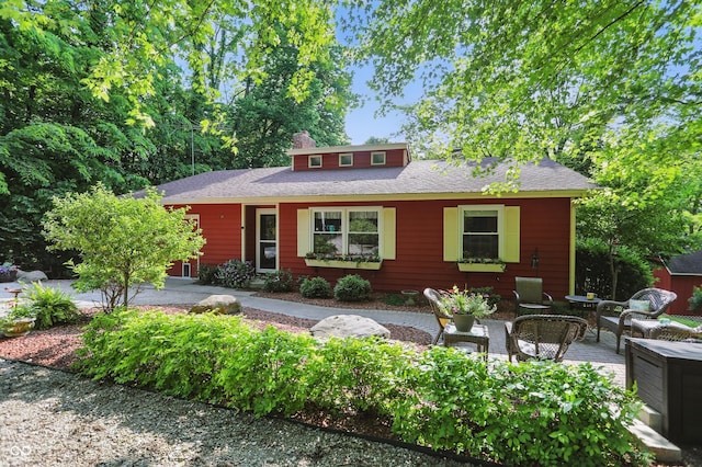1712 S Flatrock River Rd, Rushville, IN 46173 - view of front of property featuring a chimney and outdoor lounge area