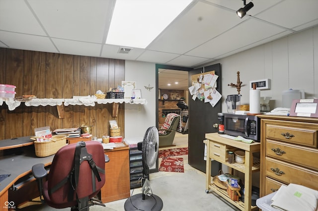 1712 S Flatrock River Rd, Rushville, IN 46173 - office with a paneled ceiling, finished concrete floors, and wood walls