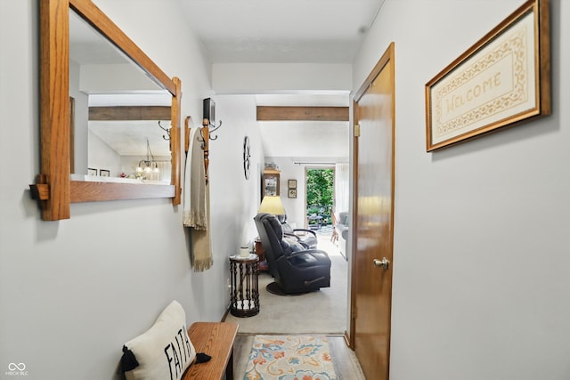 1712 S Flatrock River Rd, Rushville, IN 46173 - corridor featuring a chandelier