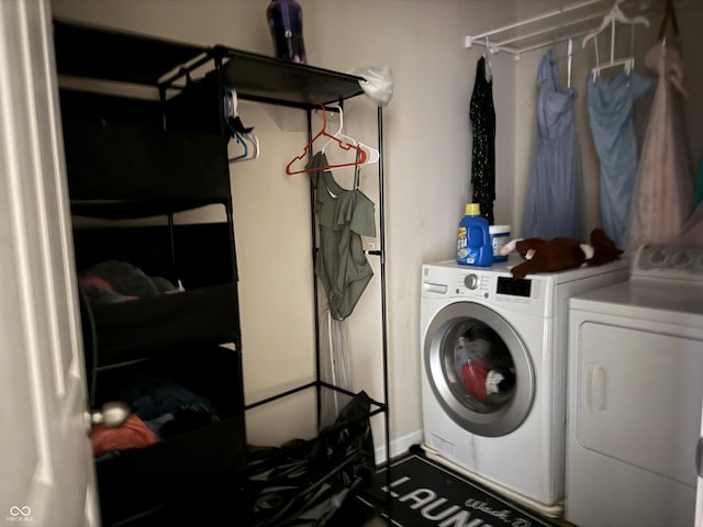 laundry area with washer and clothes dryer