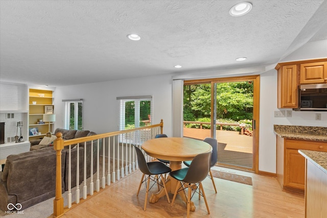 3479 Sugar Loaf Ct, Carmel, IN 46033 - dining space featuring a textured ceiling, light wood-type flooring, and recessed lighting