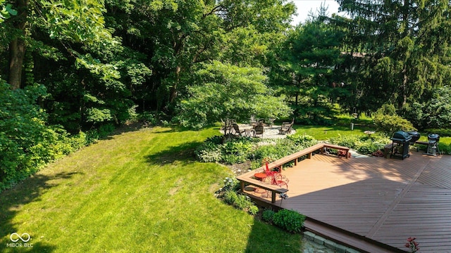3479 Sugar Loaf Ct, Carmel, IN 46033 - view of green lawn featuring a fire pit and a deck