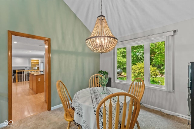 3479 Sugar Loaf Ct, Carmel, IN 46033 - dining room featuring light carpet and a chandelier