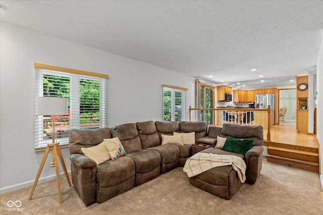 3479 Sugar Loaf Ct, Carmel, IN 46033 - living room with a textured ceiling, plenty of natural light, light colored carpet, and recessed lighting