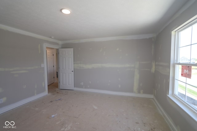 5517 Sienna Ct, Brownsburg, IN 46112 - spare room with baseboards and a textured ceiling