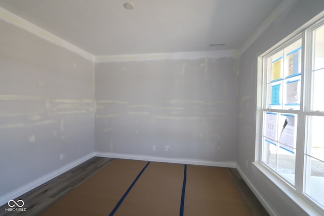 5517 Sienna Ct, Brownsburg, IN 46112 - unfurnished room featuring baseboards and dark wood-type flooring