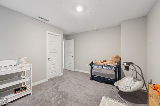 15418 Tattersalls Ln, Fishers, IN 46040 - carpeted bedroom featuring baseboards and a textured ceiling
