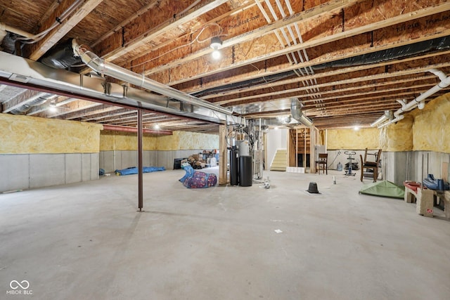 15418 Tattersalls Ln, Fishers, IN 46040 - unfinished below grade area with stairs and a water softener system