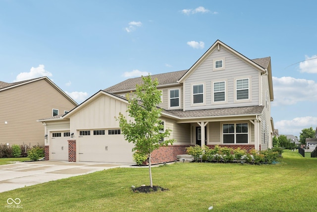 15418 Tattersalls Ln, Fishers, IN 46040 - view of front of property featuring a garage, driveway, a front lawn, board and batten siding, and roof with shingles