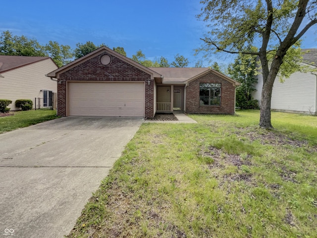 4825 May Ridge Ln, Indianapolis, IN 46254 - ranch-style home with brick siding, an attached garage, driveway, and a front yard