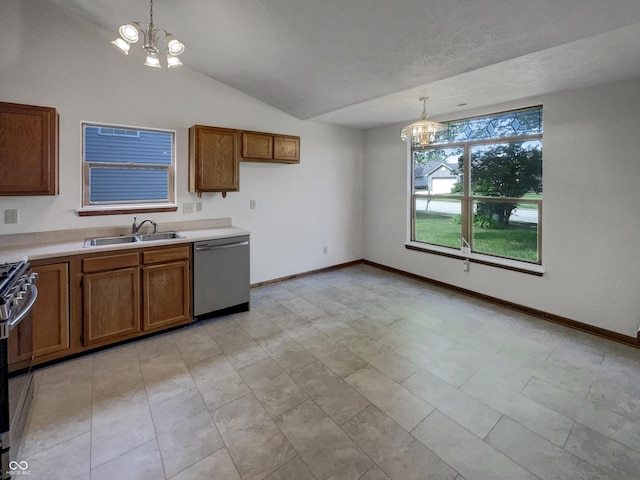 4825 May Ridge Ln, Indianapolis, IN 46254 - kitchen with a chandelier, appliances with stainless steel finishes, brown cabinetry, a sink, and lofted ceiling