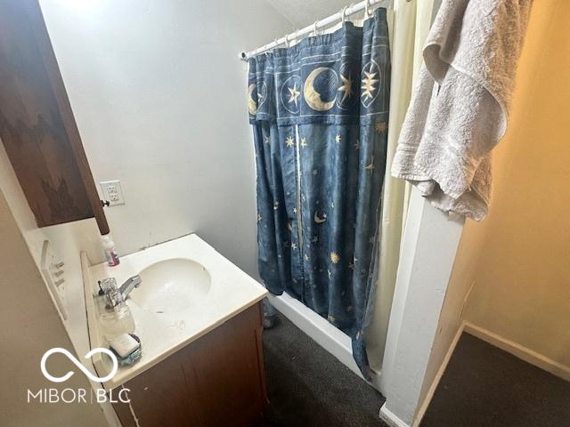 162 N Gladstone Ave, Columbus, IN 47201 - bathroom with vanity and a shower with shower curtain