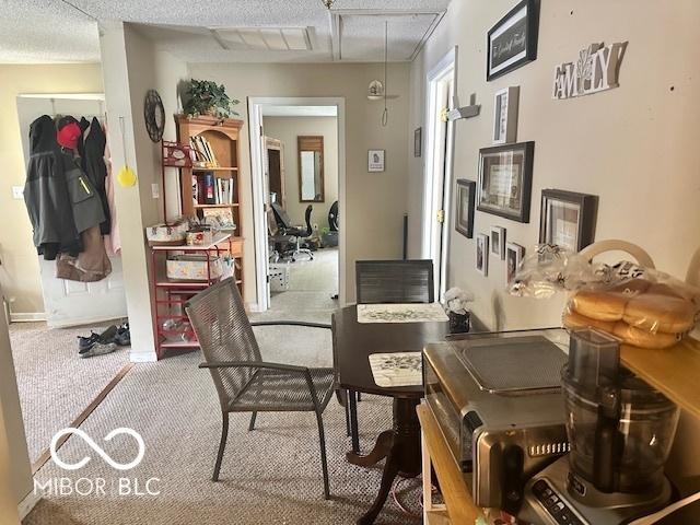 162 N Gladstone Ave, Columbus, IN 47201 - carpeted home office featuring attic access and baseboards