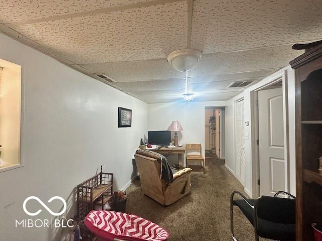162 N Gladstone Ave, Columbus, IN 47201 - living area featuring baseboards, carpet floors, and an office area