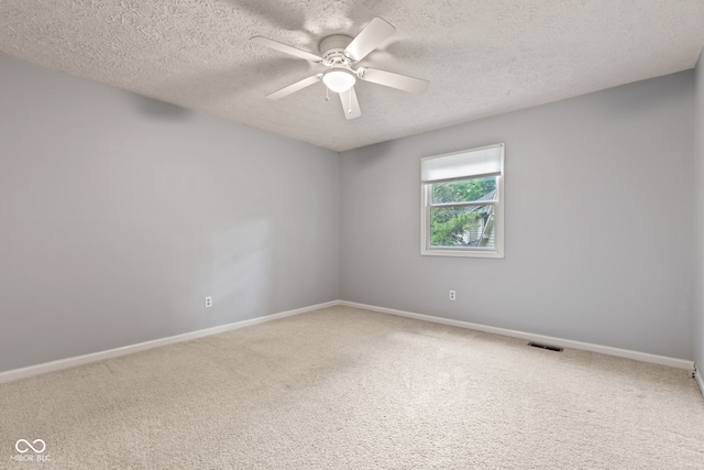 8934 Pinyon Ct, Indianapolis, IN 46260 - carpeted empty room featuring a textured ceiling, a ceiling fan, and baseboards