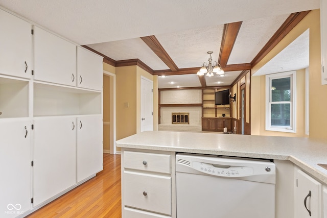 8934 Pinyon Ct, Indianapolis, IN 46260 - kitchen featuring white dishwasher, white cabinets, light wood finished floors, a chandelier, and a peninsula