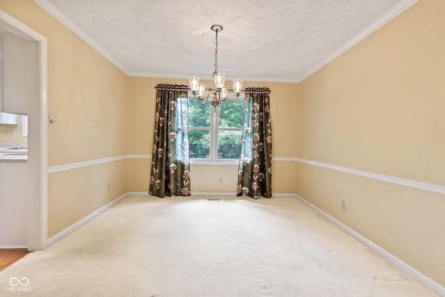 8934 Pinyon Ct, Indianapolis, IN 46260 - carpeted spare room featuring a chandelier, a textured ceiling, crown molding, and baseboards