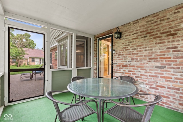 8934 Pinyon Ct, Indianapolis, IN 46260 - sunroom featuring outdoor dining area