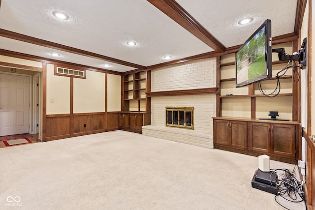 8934 Pinyon Ct, Indianapolis, IN 46260 - unfurnished living room with a textured ceiling, carpet floors, recessed lighting, crown molding, and a fireplace
