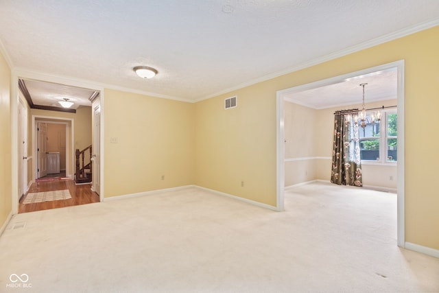 8934 Pinyon Ct, Indianapolis, IN 46260 - carpeted empty room with crown molding, baseboards, a chandelier, and stairway