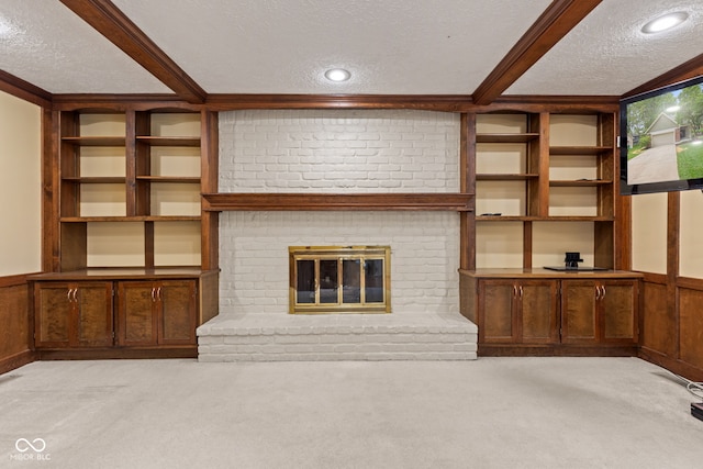 8934 Pinyon Ct, Indianapolis, IN 46260 - unfurnished living room featuring a textured ceiling, light carpet, a fireplace, wainscoting, and wooden walls