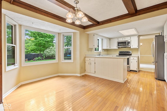 8934 Pinyon Ct, Indianapolis, IN 46260 - kitchen with appliances with stainless steel finishes, light wood-type flooring, light countertops, baseboards, and beam ceiling