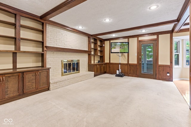 8934 Pinyon Ct, Indianapolis, IN 46260 - unfurnished living room with a textured ceiling, carpet flooring, wainscoting, beamed ceiling, and ornamental molding